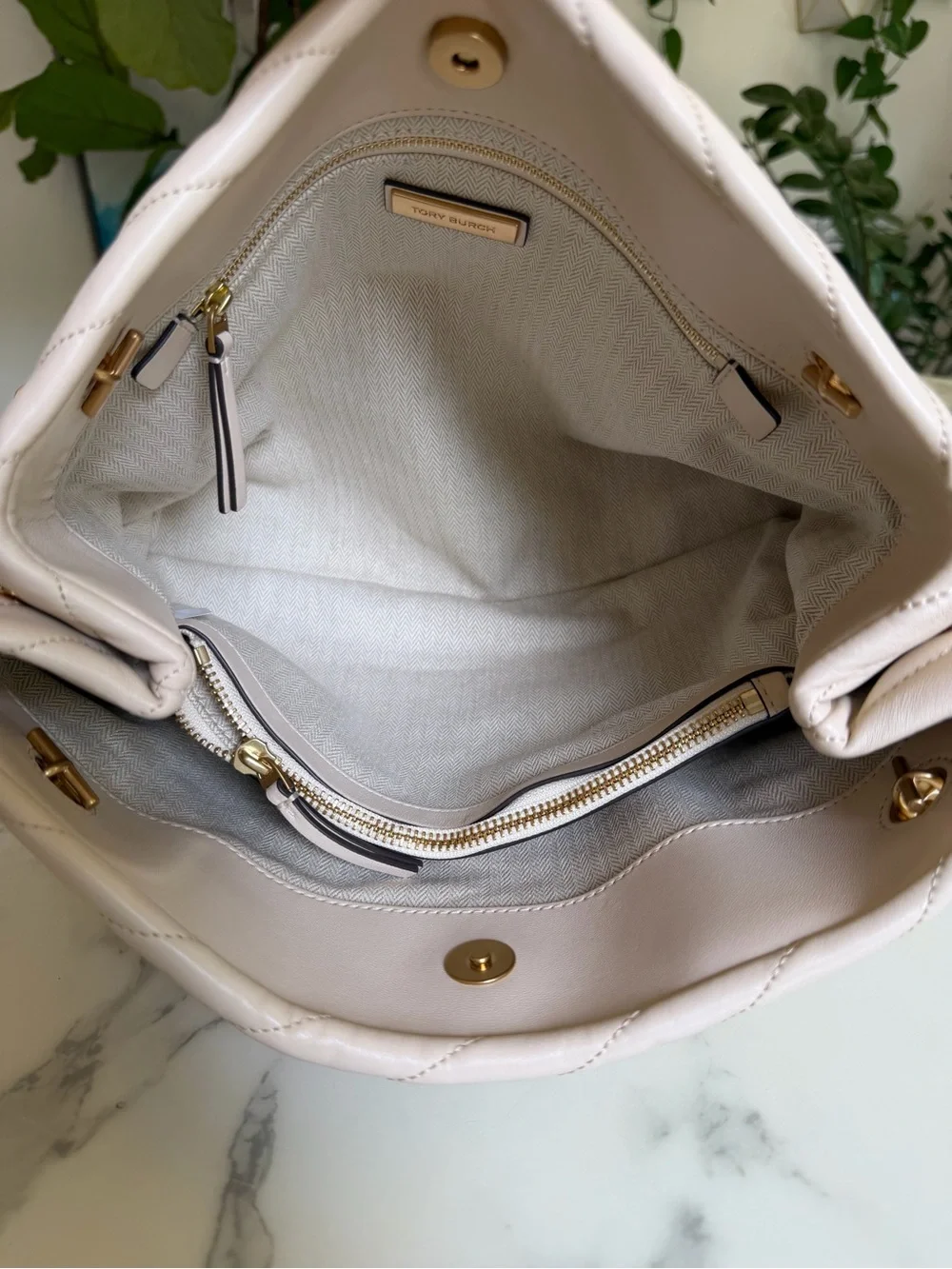 Tory Burch excellent she